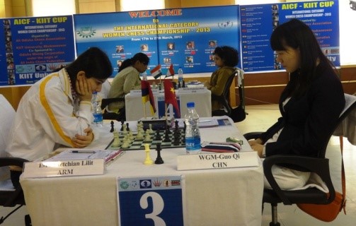 Guo Qui (right) was steady against Lilit until the mistake cost her dearly