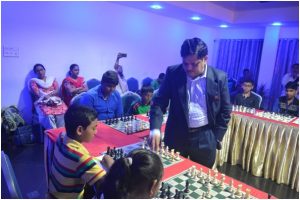 Mr.Lanka Ravi International Master &Sr FIDE Trainer playing with local talents.